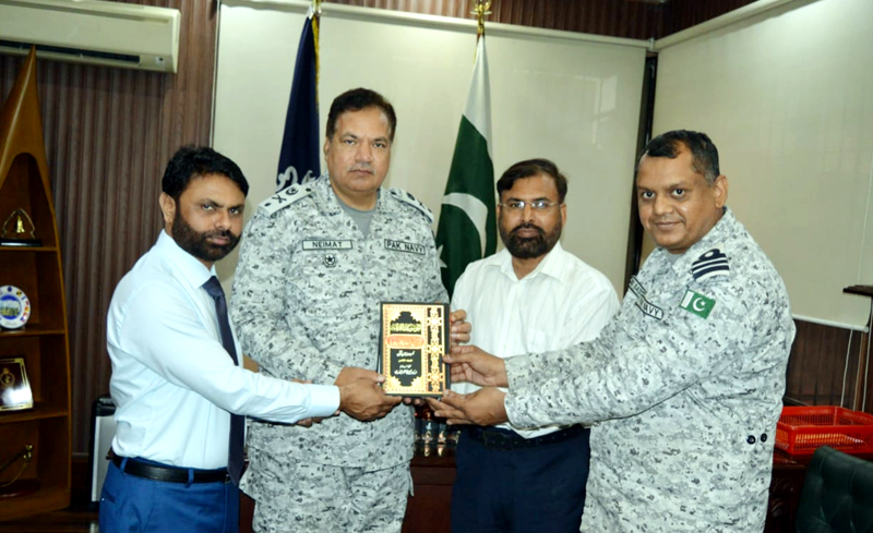 Sohail Raza presents the Quranic Encyclopedia to Naval Station Commander Lahore