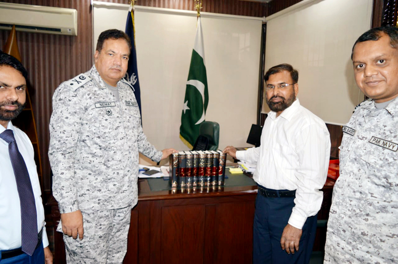 Sohail Raza presents the Quranic Encyclopedia to Naval Station Commander Lahore
