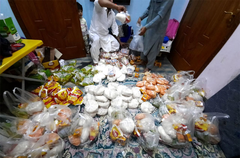 Minhaj Welfare Foundation distributes ration among families