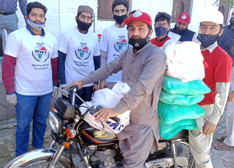 Ration distribution by Minhaj Welfare Foundation