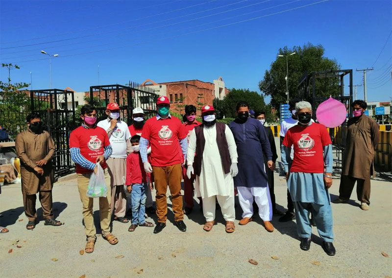 Ration distribution by Minhaj Welfare Foundation