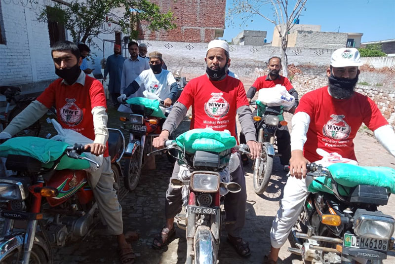 Ration distribution by Minhaj Welfare Foundation