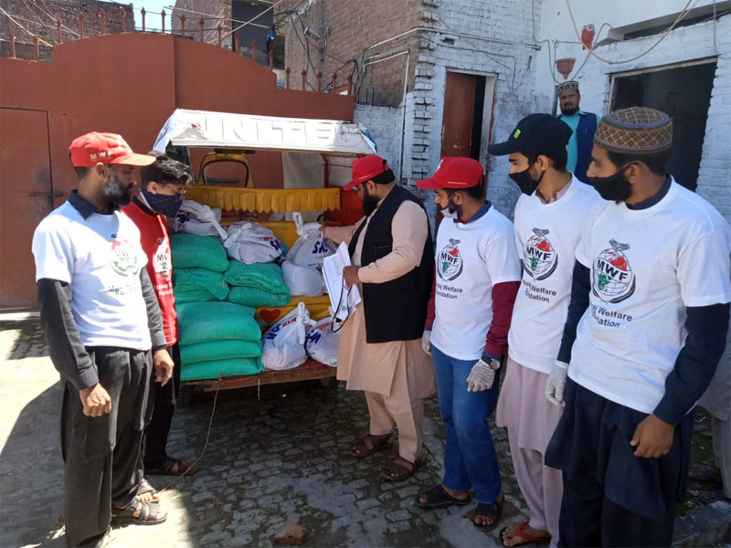 Ration distribution by Minhaj Welfare Foundation