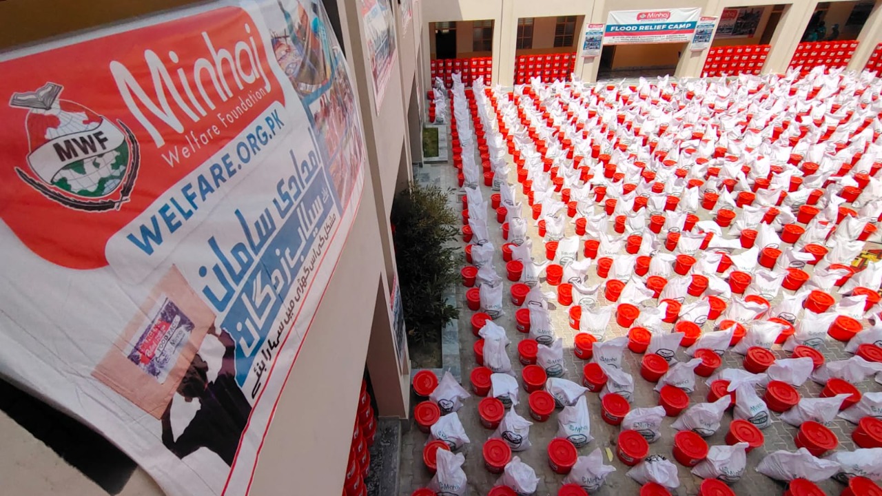 Minhaj Welfare Foundation distributing hygiene kits along with food bags in flood-hit areas