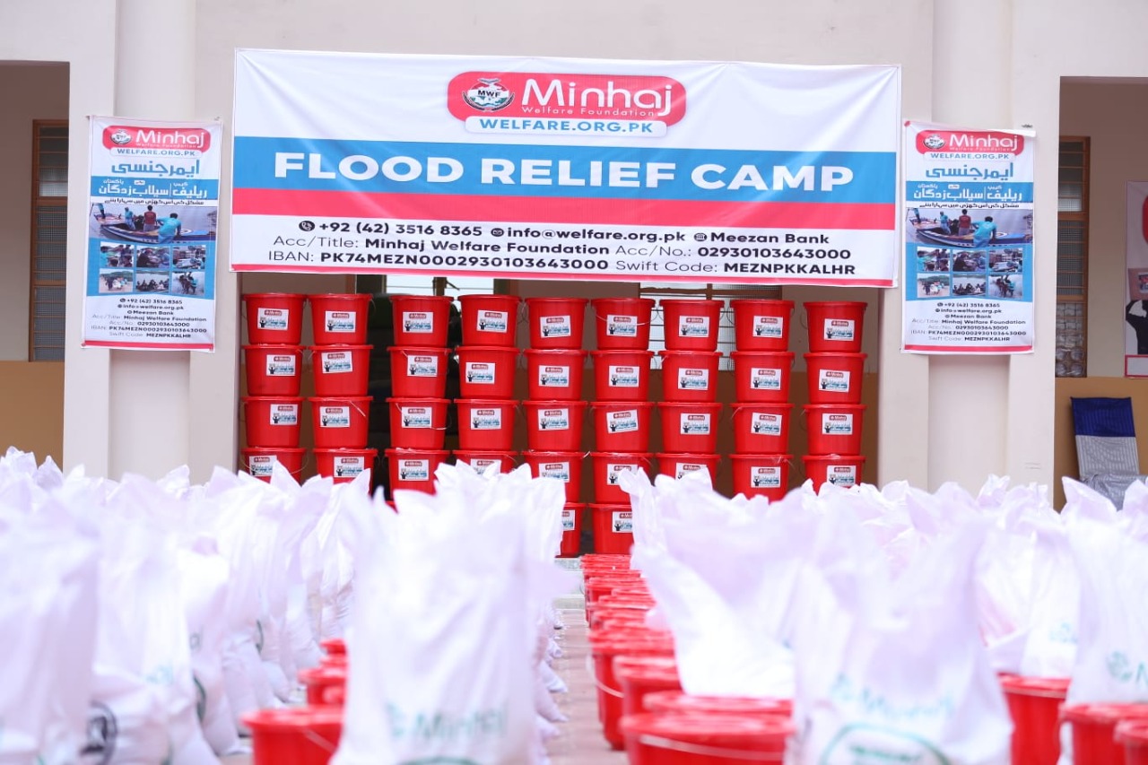 Minhaj Welfare Foundation distributing hygiene kits along with food bags in flood-hit areas