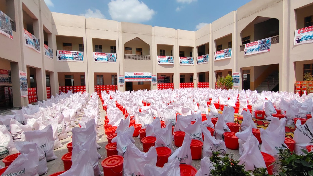 Minhaj Welfare Foundation distributing hygiene kits along with food bags in flood-hit areas