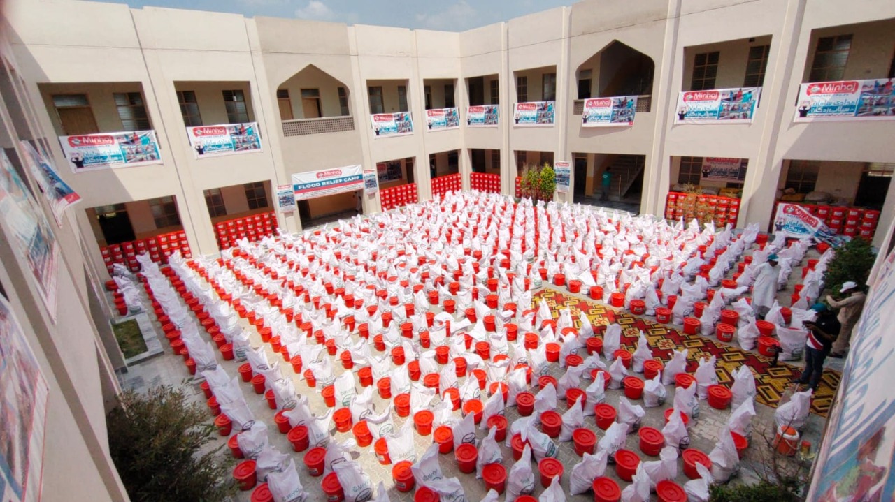 Minhaj Welfare Foundation distributing hygiene kits along with food bags in flood-hit areas