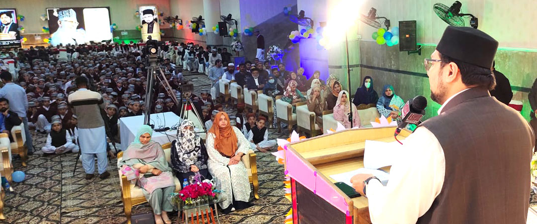 Dr. Hussain Qadri addressing a Qirat ceremony at Tehfeez-ul-Quran