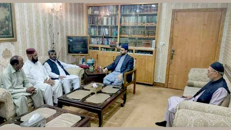 Haji Hameedullah and Haji M Asghar meeting with Dr Hassan Qadri