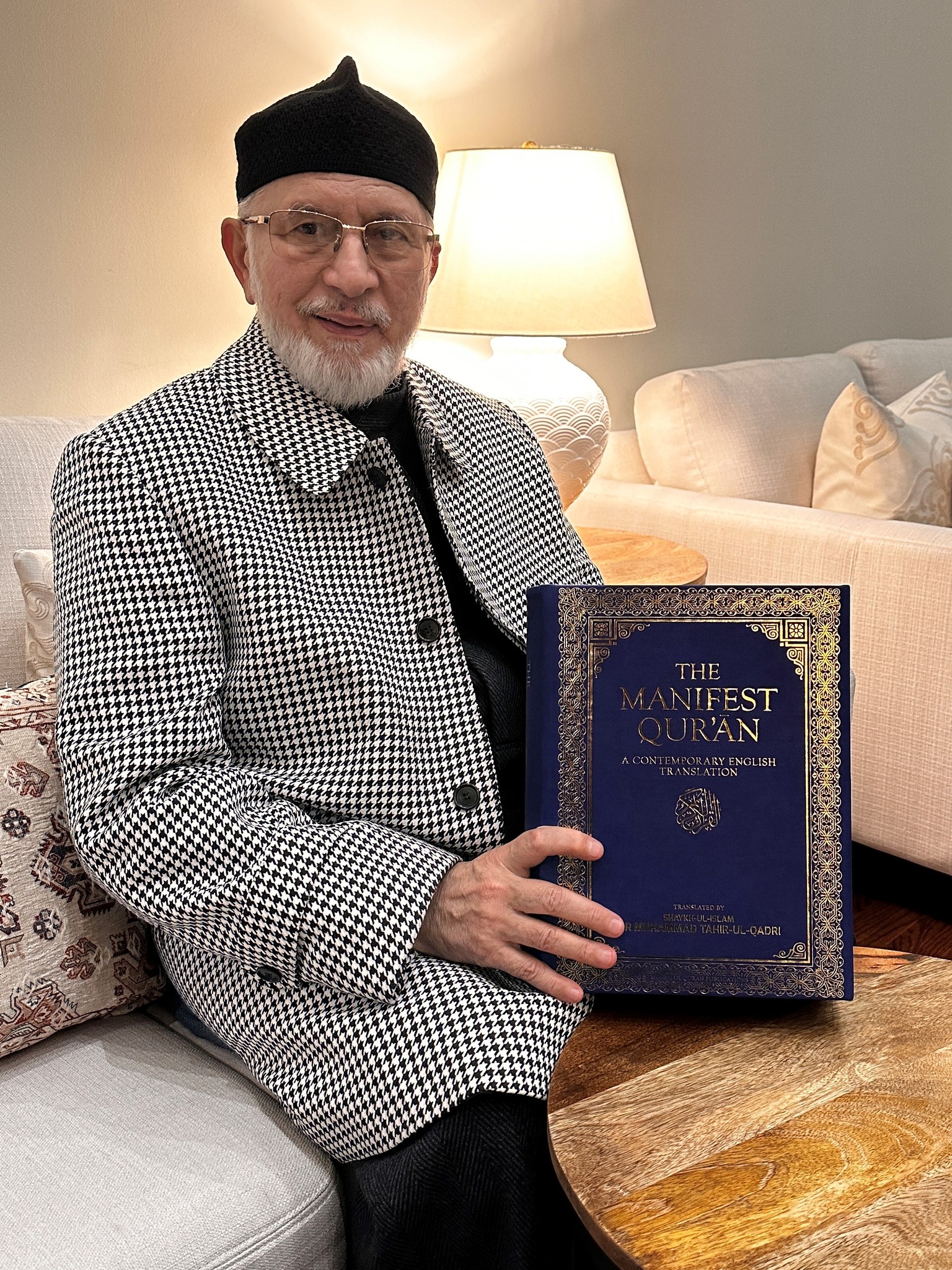 Dr Tahir ul Qadri receives first copy of The Manifest Quran