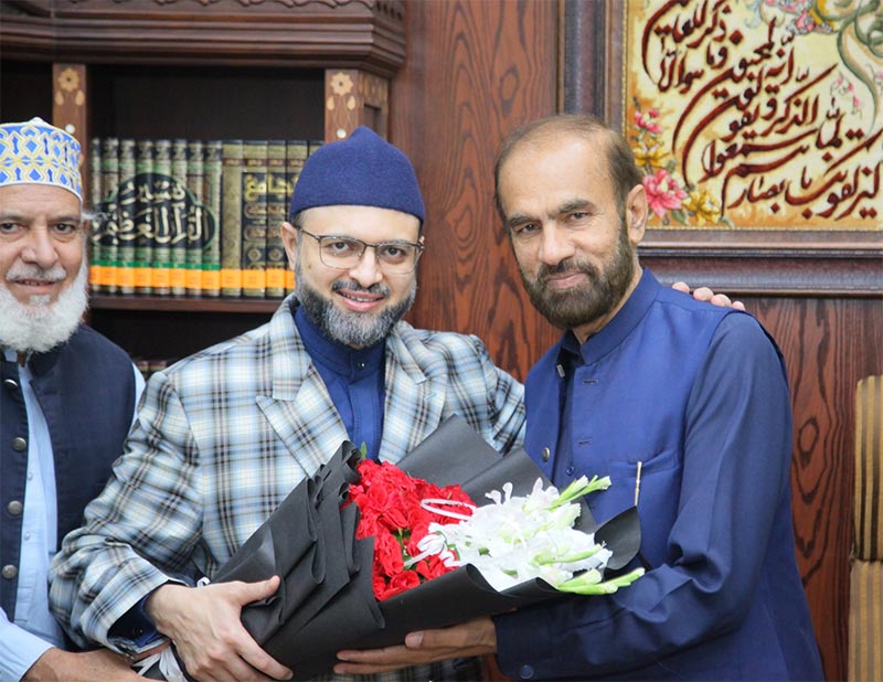 Dr Hassan Mohiuddin Qadri Congratulates Dr Rafiq Najam on PhD Completion