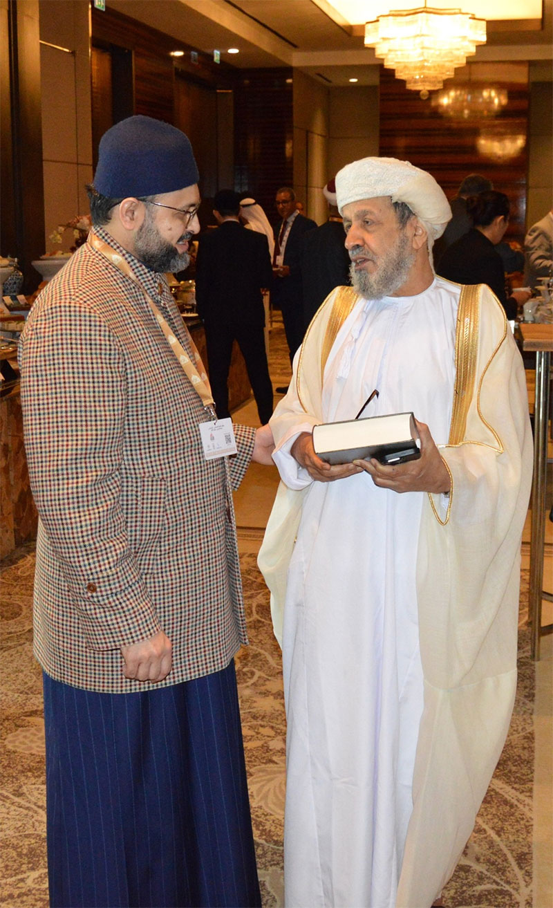 Dr. Hassan Mohiuddin Qadri Presents Dustur al-Madina al-Munawwara to Prof. Abbas Shuman