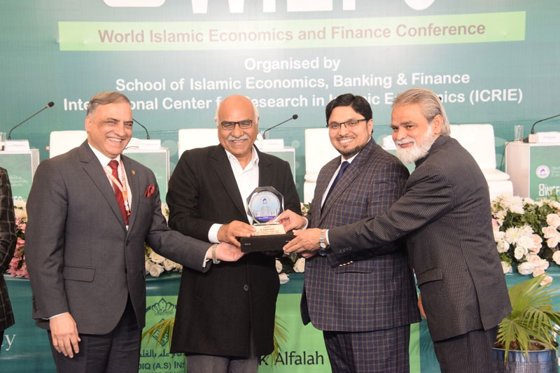 Prof. Dr. Hussain Mohi-ud-Din Qadri present shields to panelists at 8th WIEFC 2025 