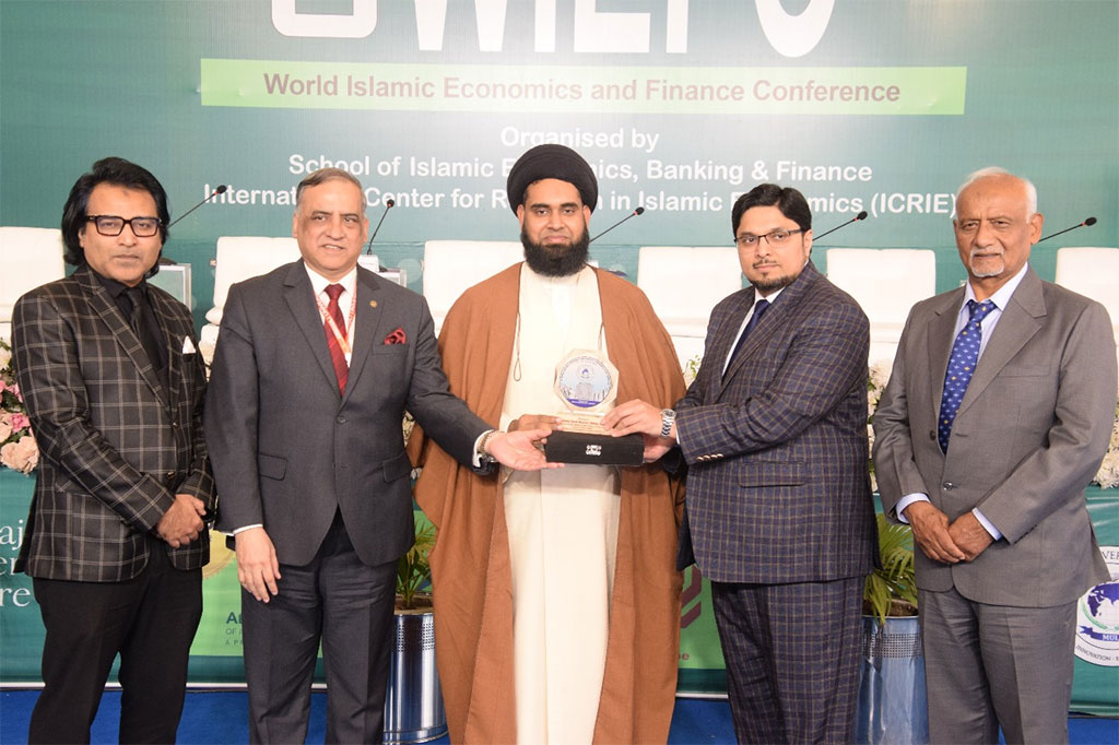 Prof. Dr. Hussain Qadri Presents Souvenirs to Panelists at 8th WIEFC 2025