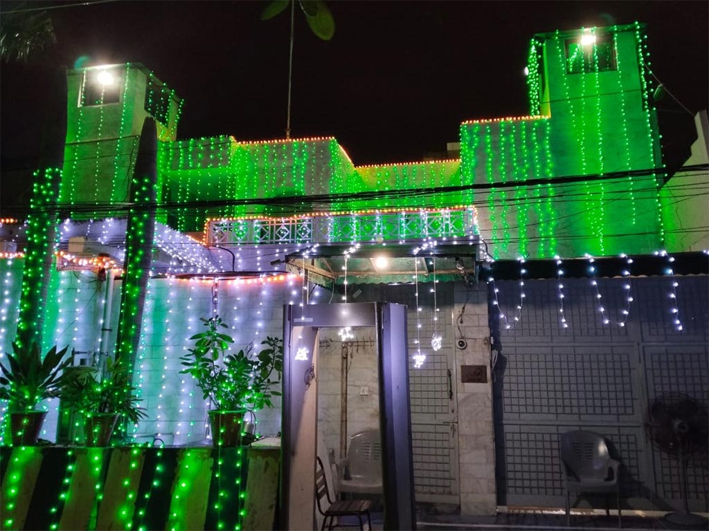 Minhaj-ul-Quran International Central Secretariat decorated with lights