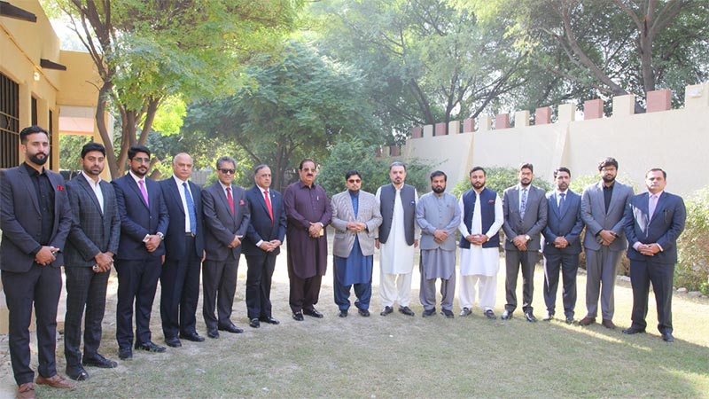 dr hussain qadri meets chairman di khan new city