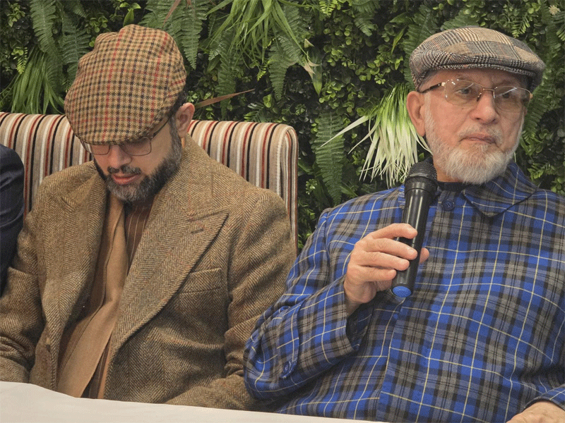 Shaykh ul Islam and Dr Hassan Qadri Giving Shields Exec Council Lisbon Portugal