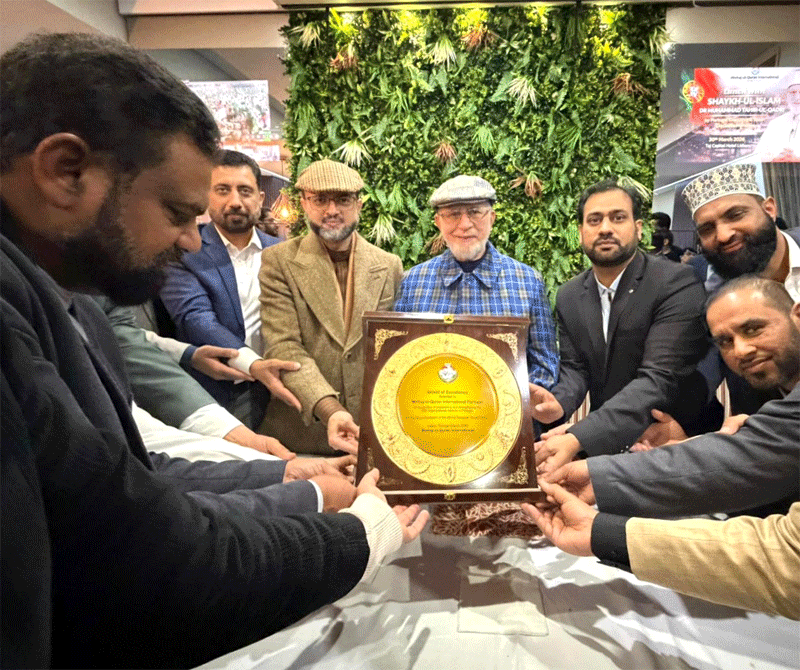 Shaykh ul Islam and Dr Hassan Qadri Giving Shields Exec Council Lisbon Portugal