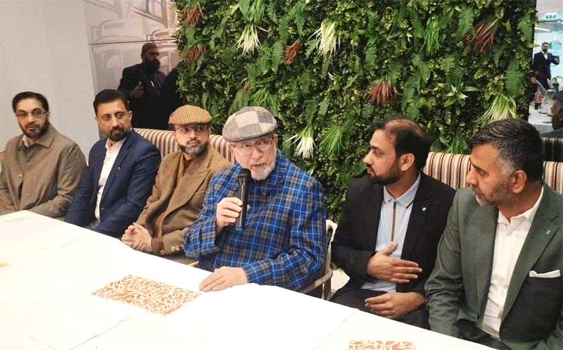Shaykh ul Islam and Dr Hassan Qadri Giving Shields Exec Council Lisbon Portugal