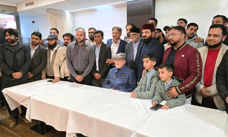 Shaykh ul Islam and Dr Hassan Qadri Giving Shields Exec Council Lisbon Portugal