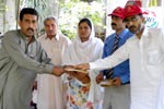MWF distributes cash and other gifts among flood victims in Charsadda