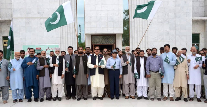 PAT holds flag hoisting ceremony, expresses solidarity with Kashmiri people