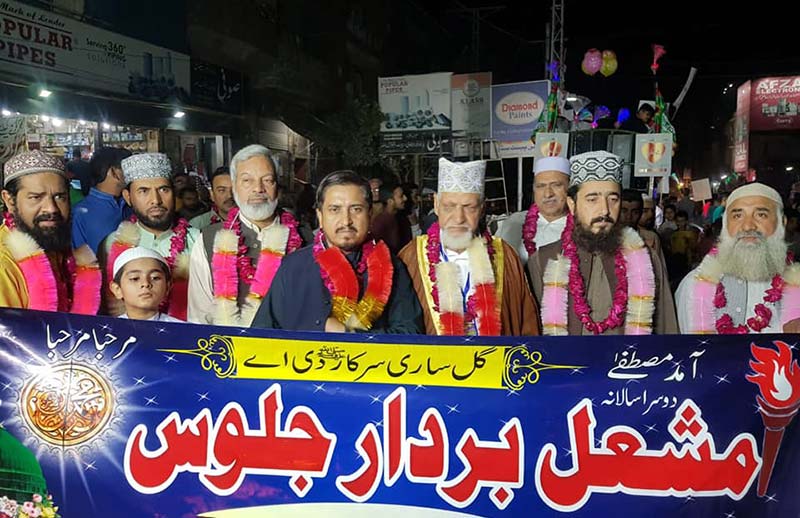 منہاج القرآن لاہور کے زیراہتمام واہگہ ٹاون اور شالیمار ٹاون میں مشعل بردار جلوس